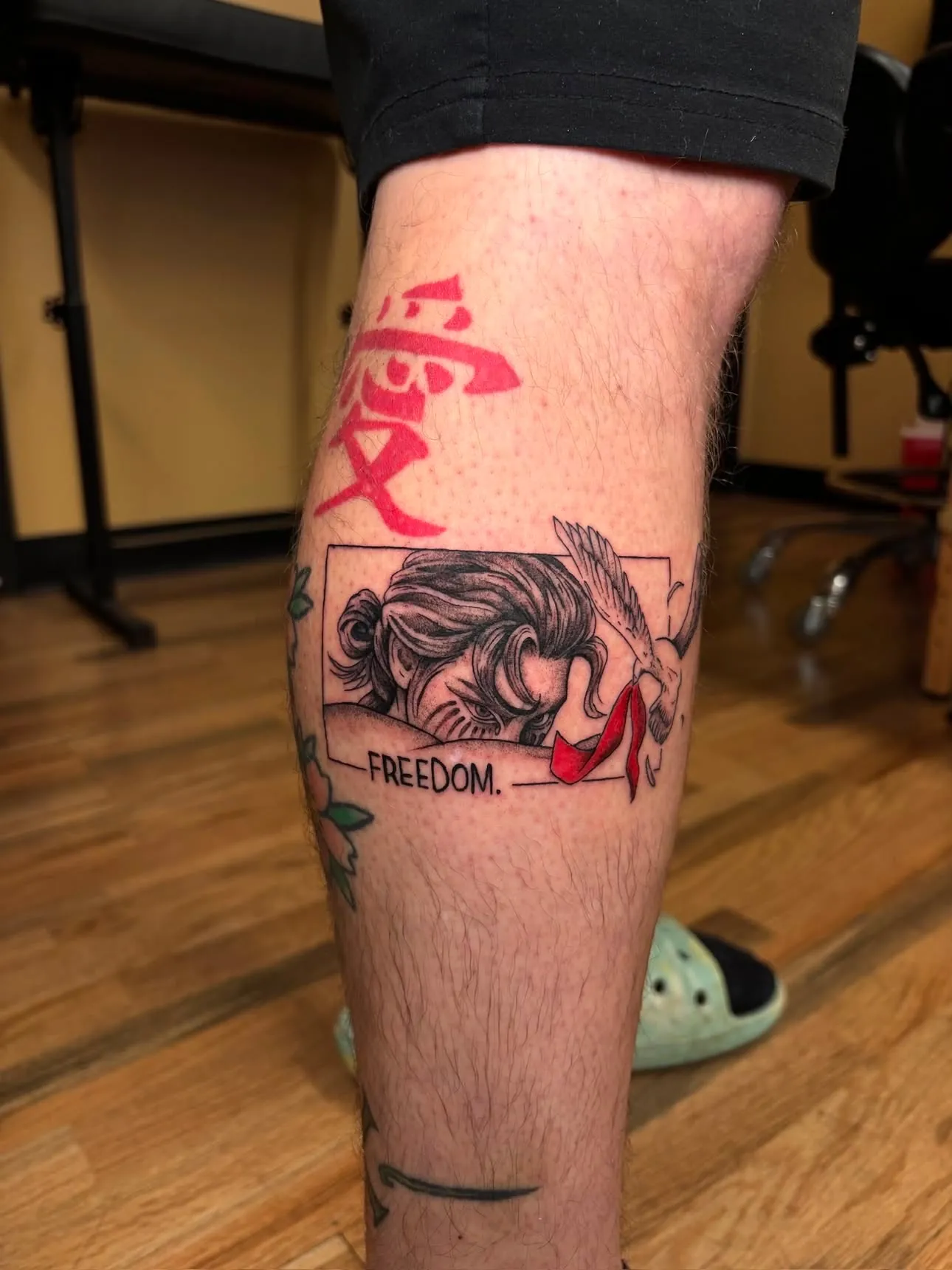 Attack on Titan Freedom calf tattoo with red kanji