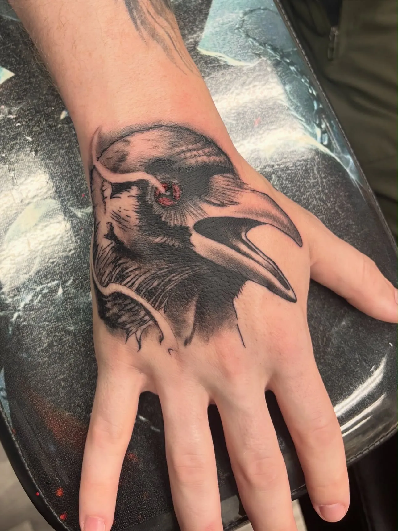 The Raven — blackwork tattoo, hand