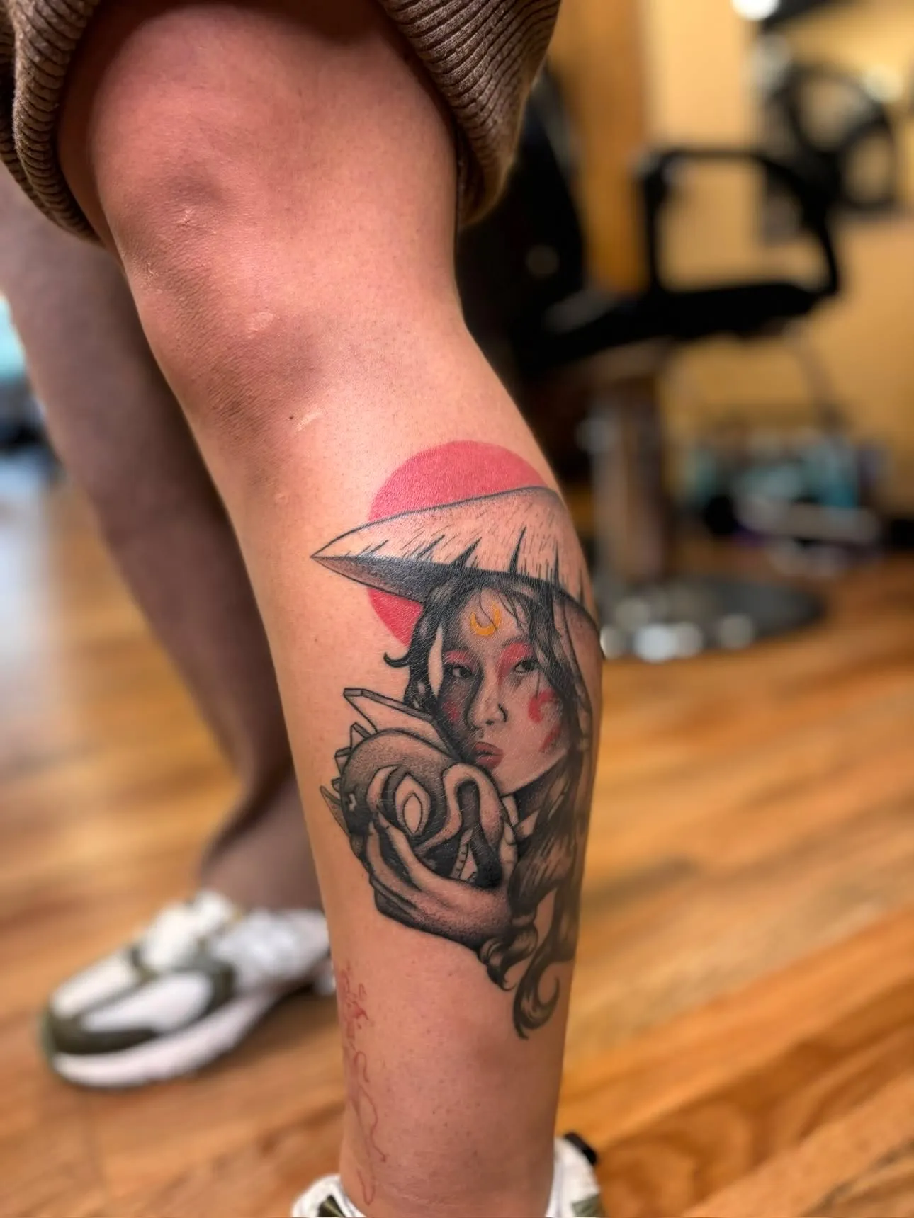 Red Sun — anime geisha calf tattoo with red sun accent by Cam Bradley
