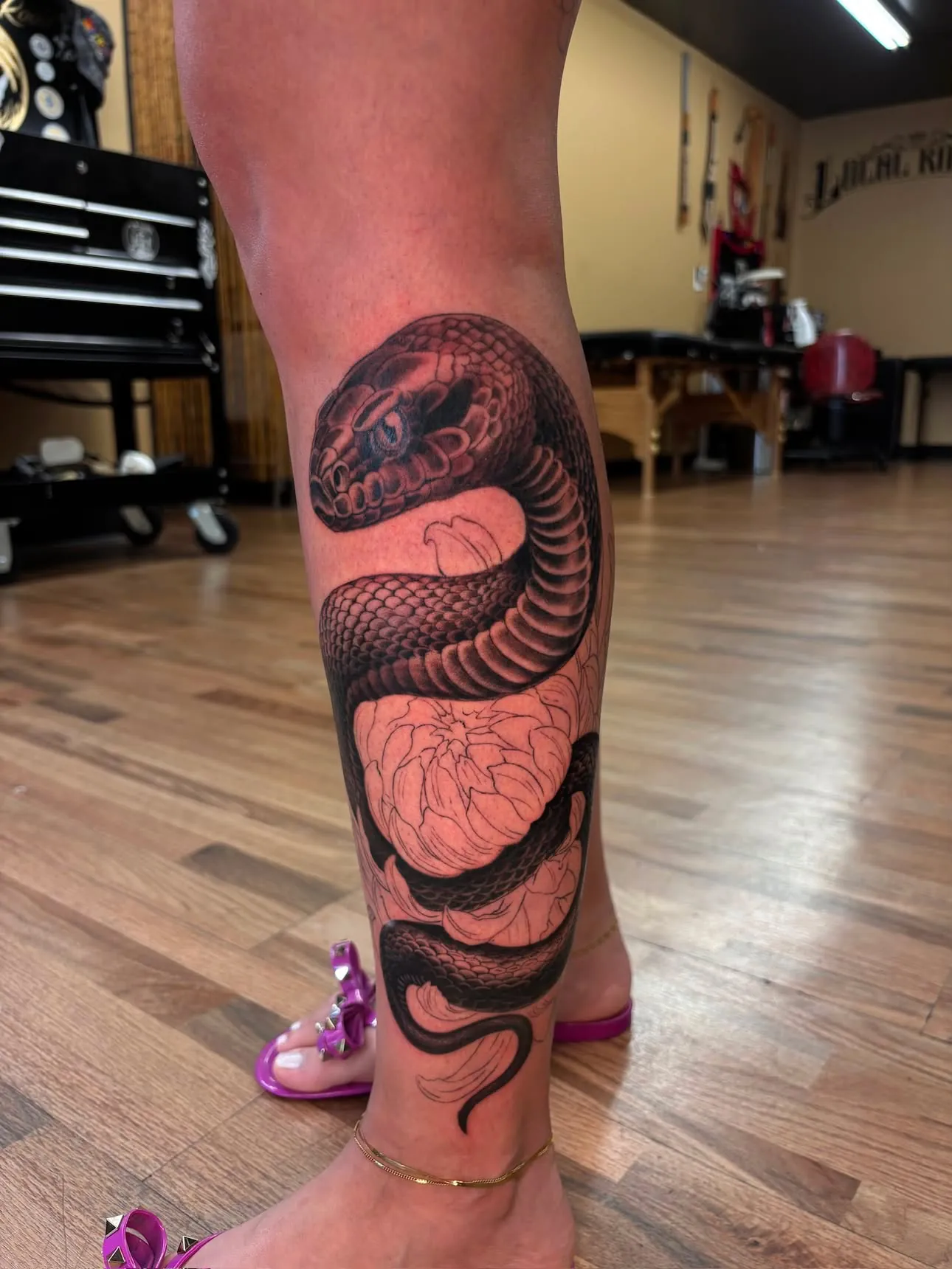Serpent ankle tattoo