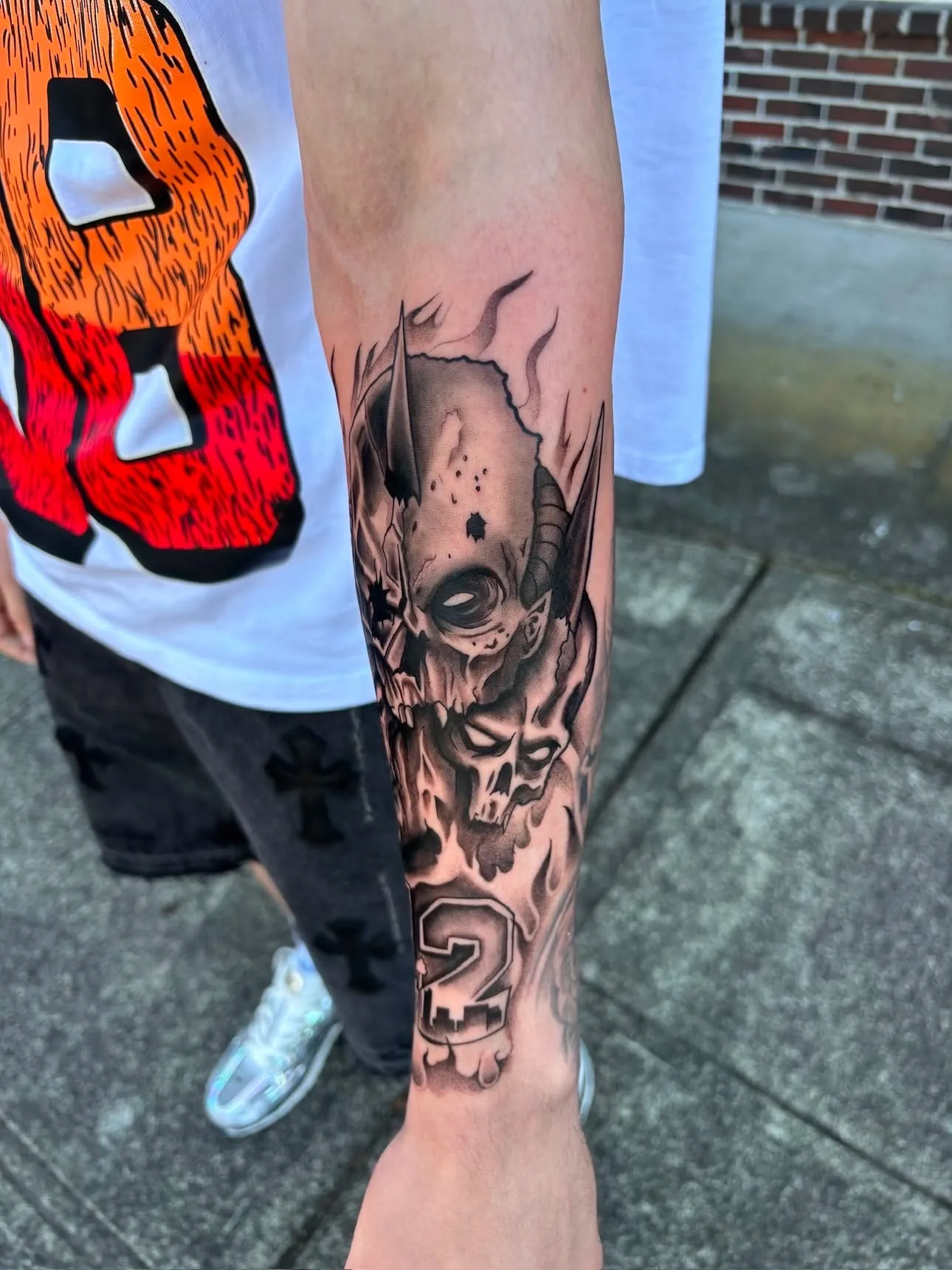 Memento — blackwork tattoo, arm